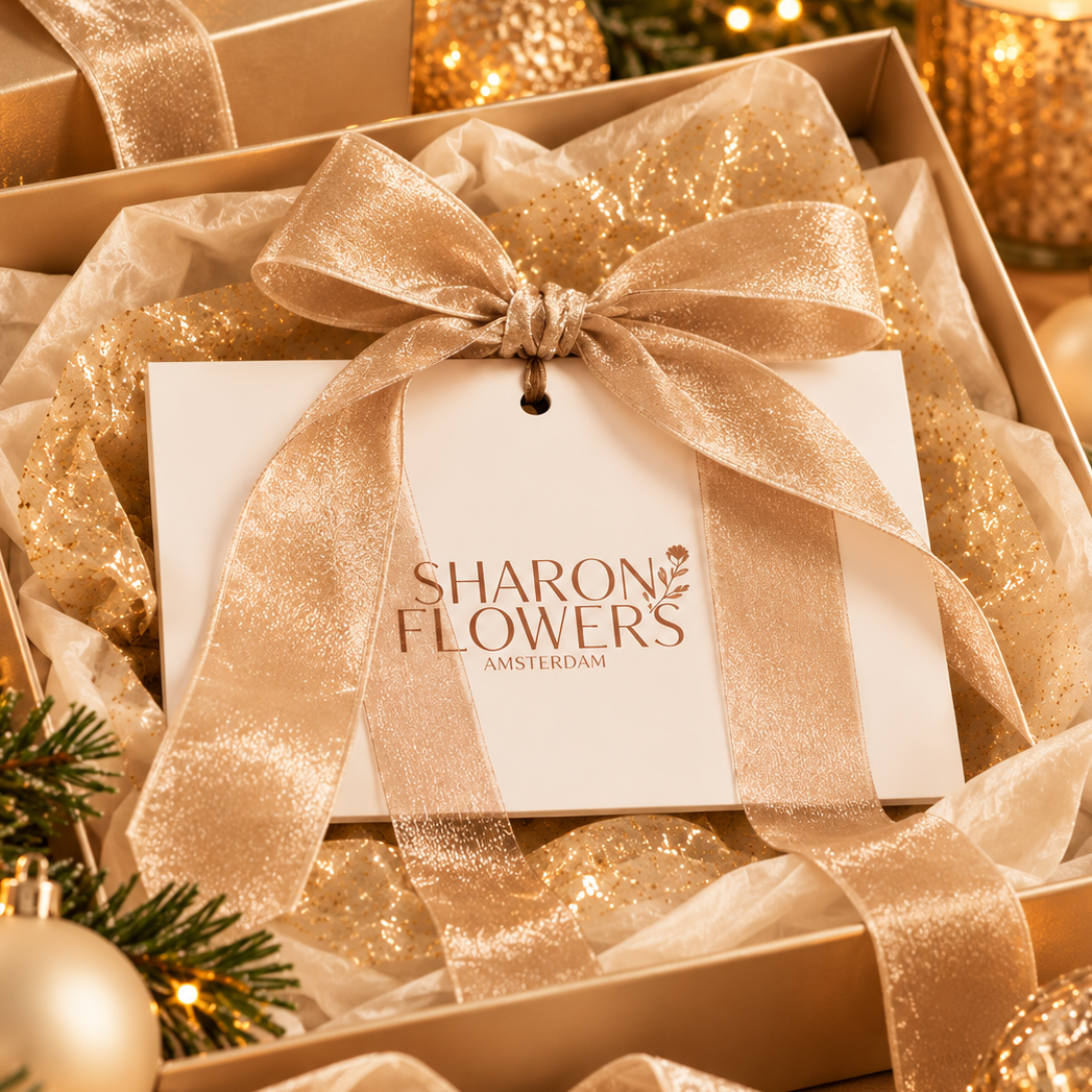 Sfeerbeeld luxe cadeaubon in gouden geschenkverpakking