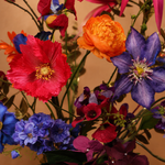 Zijden boeket Sunset van Sharon Flowers in warme peach, roze, oranje en gele tinten